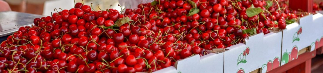 boxes-full-of-fresh-red-cherries-for-sale-at-marke-2023-11-27-05-29-57-utc